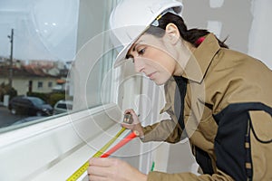 portrait woman window installer