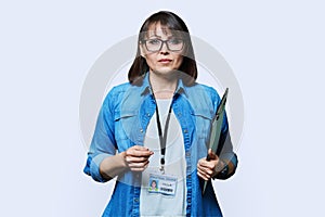 Portrait of woman worker with industrial center card clipboard, on white background