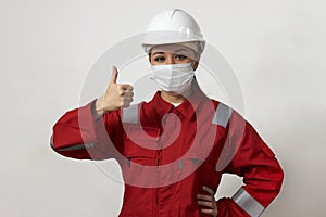 Portrait of a woman worker wearing medical mask
