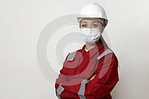 Portrait of a woman worker wearing medical mask