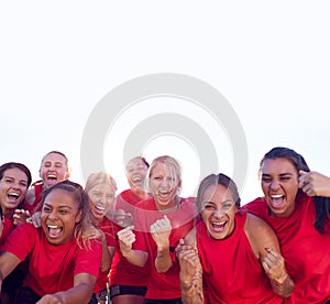 Portrait Of Womens Football Team Celebrating Winning Soccer Match On Outdoor Astro Turf Pitch