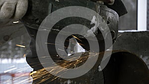 Portrait of a worker. Clip. A strong experienced man has finished the hard work on welding and lifts the mask.