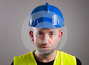 Portrait of a worker expressing negativity