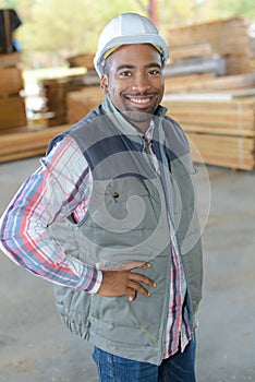 Portrait worker in woodyard