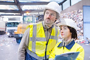 Portrait workers on recycling plant