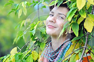 Portrait in yellow leaves