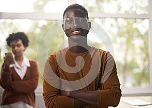 Portrait of a young African American business man in office