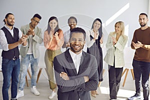 Portrait of young african american businessman who is looking at camera with confident expression.