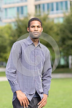 Portrait of young African American man in residential neighborho