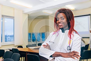 Portrait Of young afrocan-american Female Doctor In Doctor`s Office