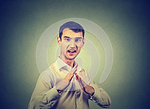 Portrait of young angry man