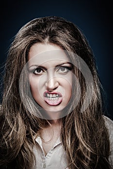 Portrait young angry woman. Negative human emotion face