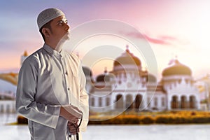 Portrait of young arab man at Baiturrahman Grand Mosque, Banda Aceh, Indonesia