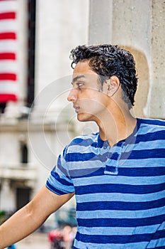 Portrait of young Asian American male teenager in New York City