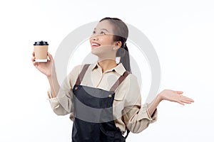 Portrait young asian barista woman wearing apron holding coffee cup and presenting isolated white background.