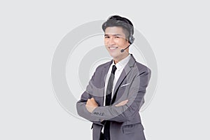 Portrait young asian business man call center wearing headset isolated on white background.