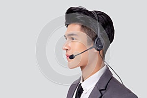 Portrait young asian business man call center wearing headset isolated on white background.