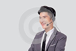 Portrait young asian business man call center wearing headset isolated on white background.