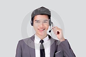 Portrait young asian business man call center wearing headset isolated on white background.