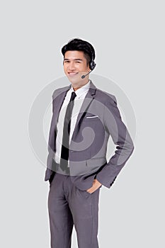 Portrait young asian business man call center wearing headset isolated on white background.