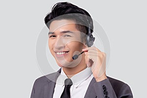 Portrait young asian business man call center wearing headset isolated on white background.