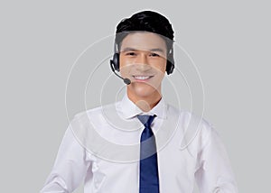 Portrait young asian business man call center wearing headset isolated on white background.