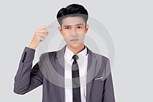 Portrait young asian business man in suit with smart thinking idea with intelligent isolated on white background.