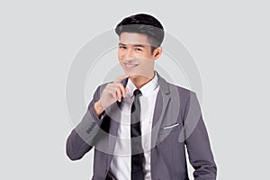 Portrait young asian business man in suit with smart thinking idea isolated on white background.