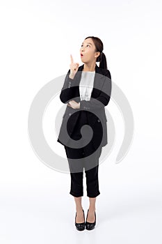 portrait young asian business woman pointing and presenting isolated on white background.