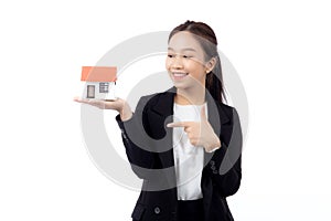 Portrait young asian businesswoman holding house for mortgage isolated white background.