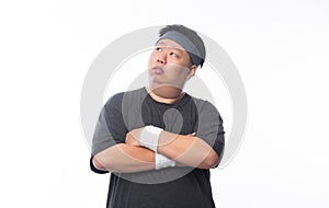 Portrait of Young Asian funny fat sport man isolated on white background.