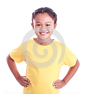 Portrait of young Asian girl with arms akimbo isolated on white