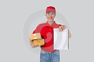 Portrait young asian man carrying box and showing document blank and presenting isolated.