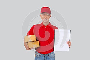 Portrait young asian man carrying box and showing document blank and presenting isolated white background.