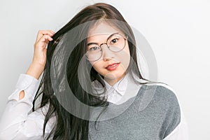 Portrait young asian nerd business woman with hipster glasses cl