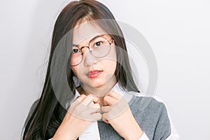 Portrait young asian nerd business woman with hipster glasses cl