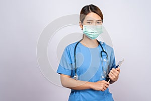 Portrait of young asian nurse wearing surgical mask