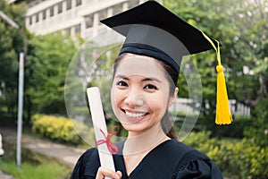 Portrait of young asian woman on her graduated day