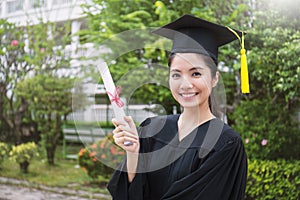 Portrait of young asian woman on her graduated day