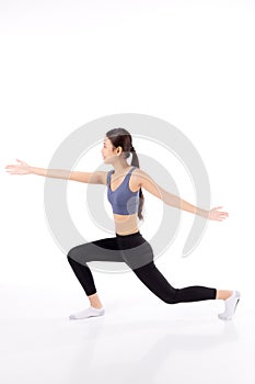 Portrait young asian woman in sportswear doing practice yoga for stretch hands isolated.