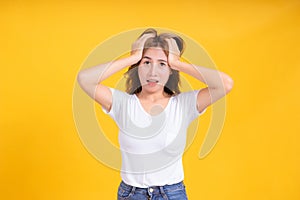 Portrait young asian woman stressed headache unhappy serious negative emotion in white t-shirt