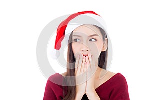 Portrait young asian woman wear santa hat with surprised
