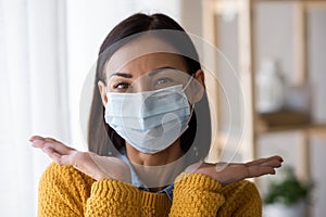 Portrait of young Asian woman,  wearing a medical surgical disposabhttpsle face mask to prevent infection