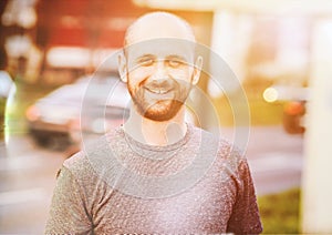 Portrait of young atractive man enjoying his day outside