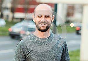 Portrait of young atractive man enjoying his day outside