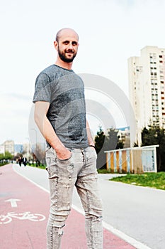 Portrait of young atractive man enjoying his day outside