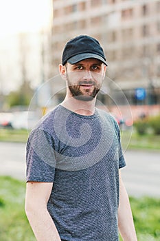 Portrait of young atractive man enjoying his day outside