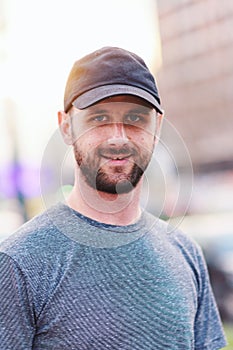 Portrait of young atractive man enjoying his day outside