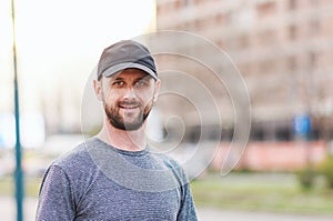 Portrait of young atractive man enjoying his day outside