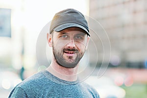 Portrait of young atractive man enjoying his day outside